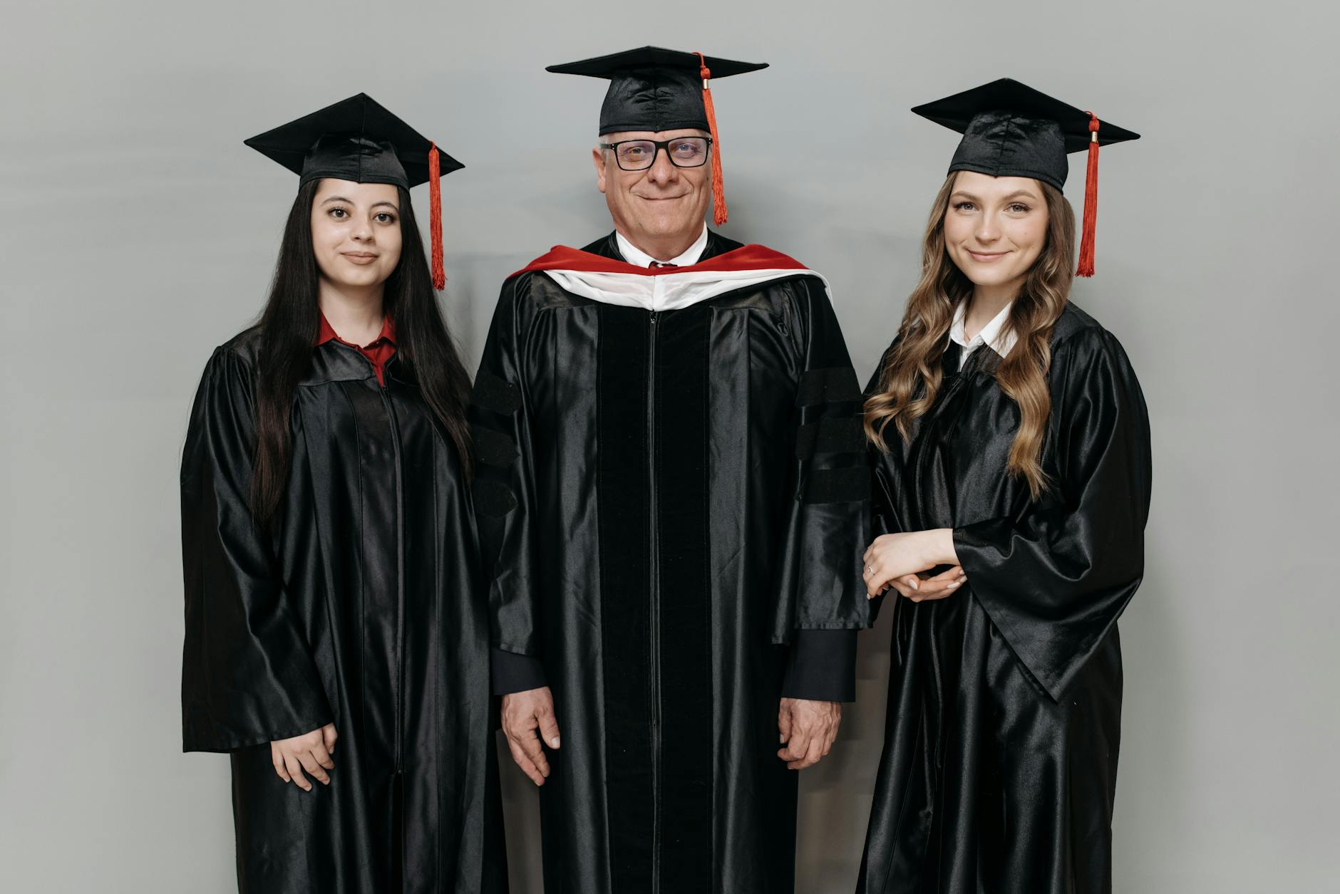 https://www.pexels.com/photo/photo-of-people-in-black-academic-gown-7943996/